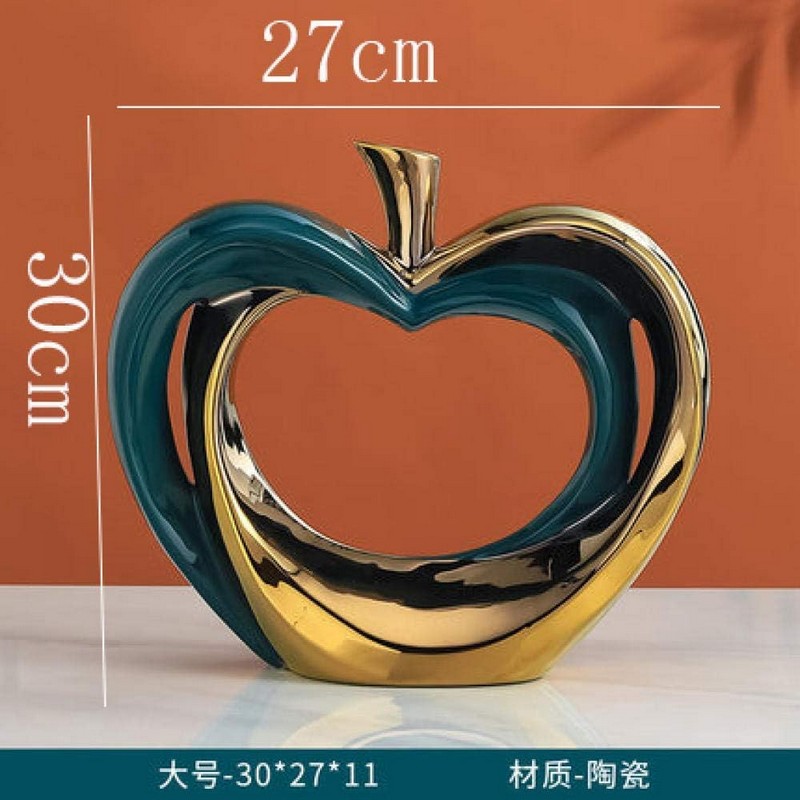 Đồ decor trang trí Táo trái tim cách điệu D07TT Chất liệu chính của sản phẩm là gốm sứ, chống ẩm mối mọt, dễ vỡ nhưng tinh xảo.